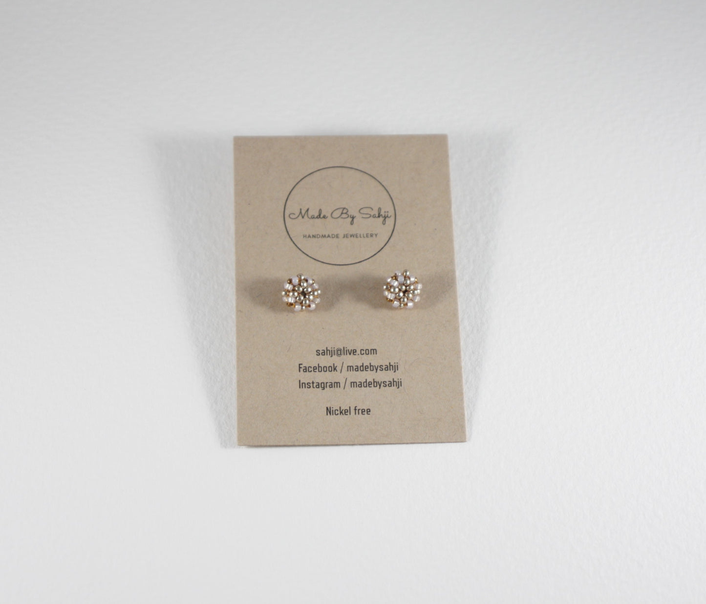 Glass bead stud earrings champagne and silver colors with stainless steel stud.