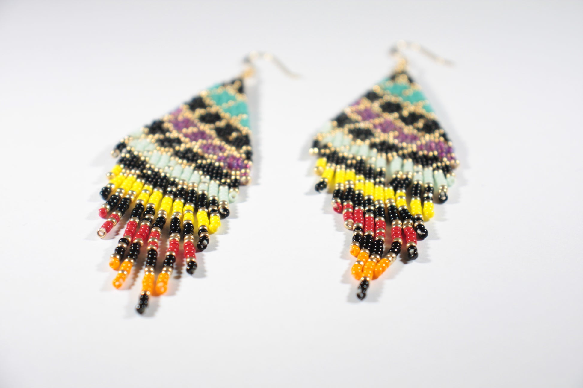 Handwoven seed bead fringe earrings grids colorful with gold color hooks.