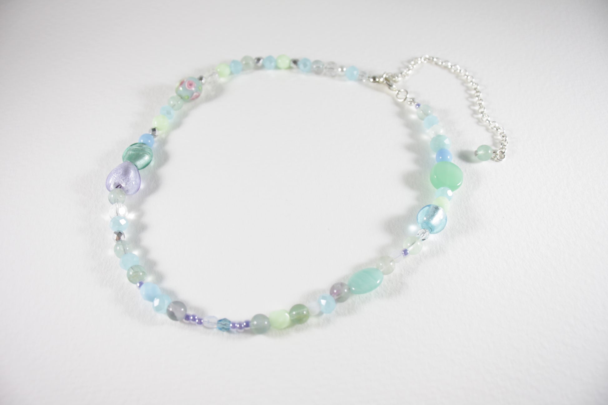 Fluorite choker necklace and different glass beads with silver color clasp and extension chain.