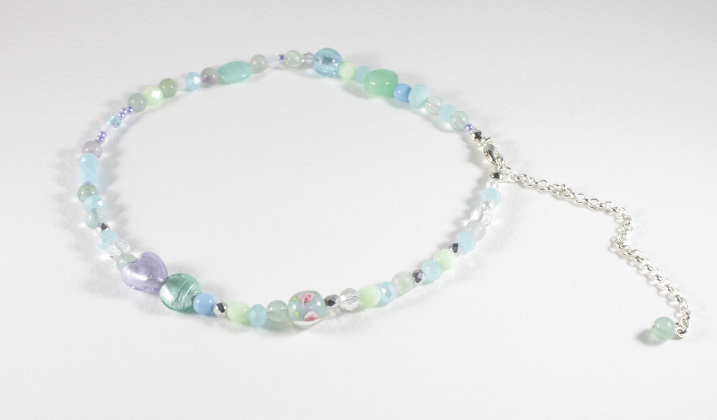 Fluorite choker necklace and different glass beads with silver color clasp and extension chain.