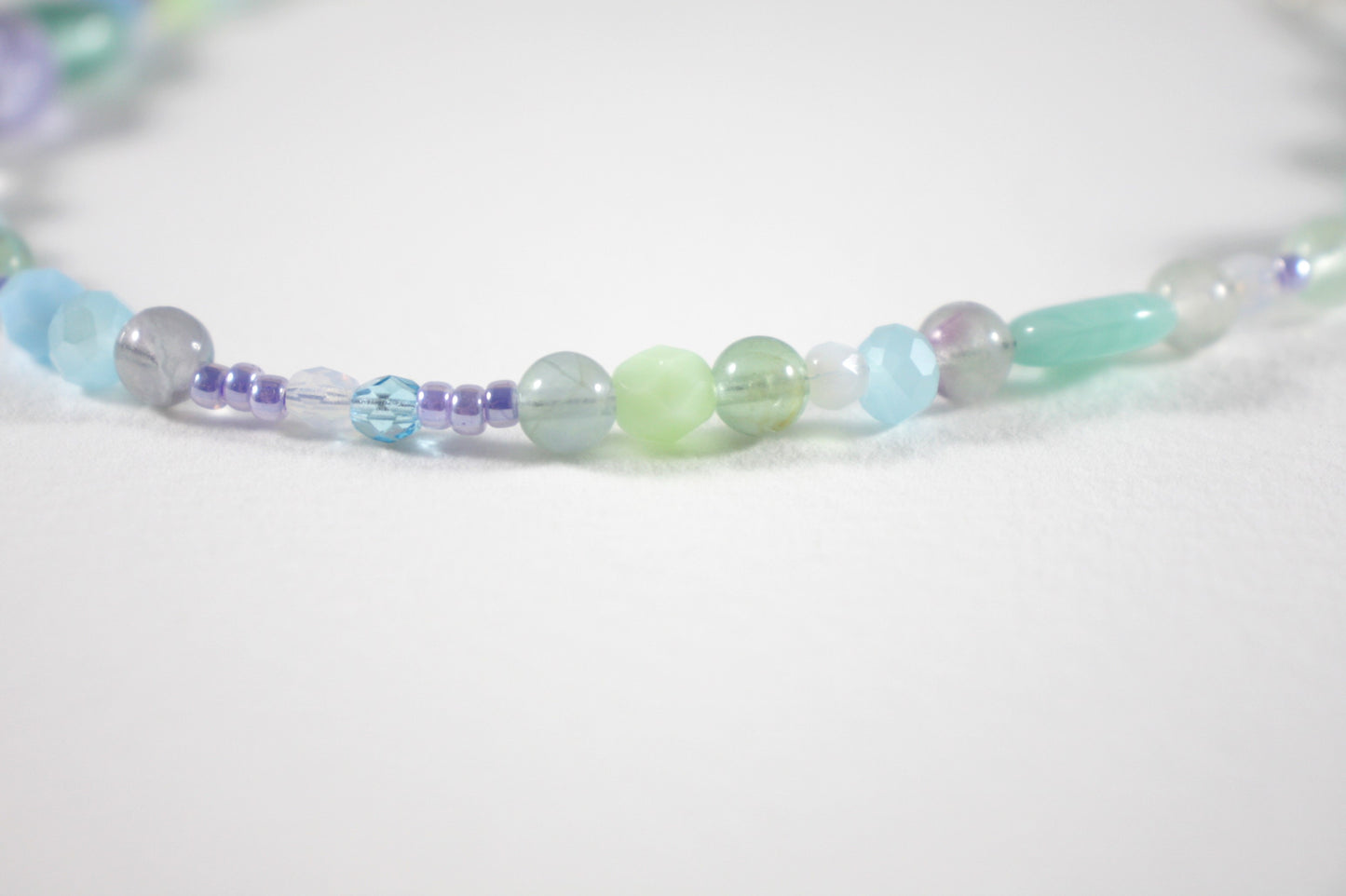 Fluorite choker necklace and different glass beads with silver color clasp and extension chain.