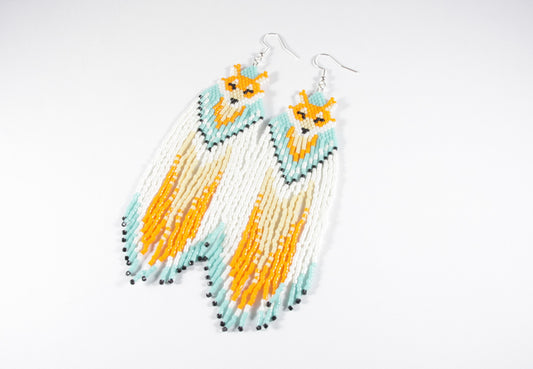 Hapsulliset lasihelmikorvakorut ketut värinä oranssi-siniturkoosi. Seed bead fringe earrings foxes, color orange and blueturquoise.