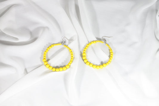 Wooden hoop earrings yellow.