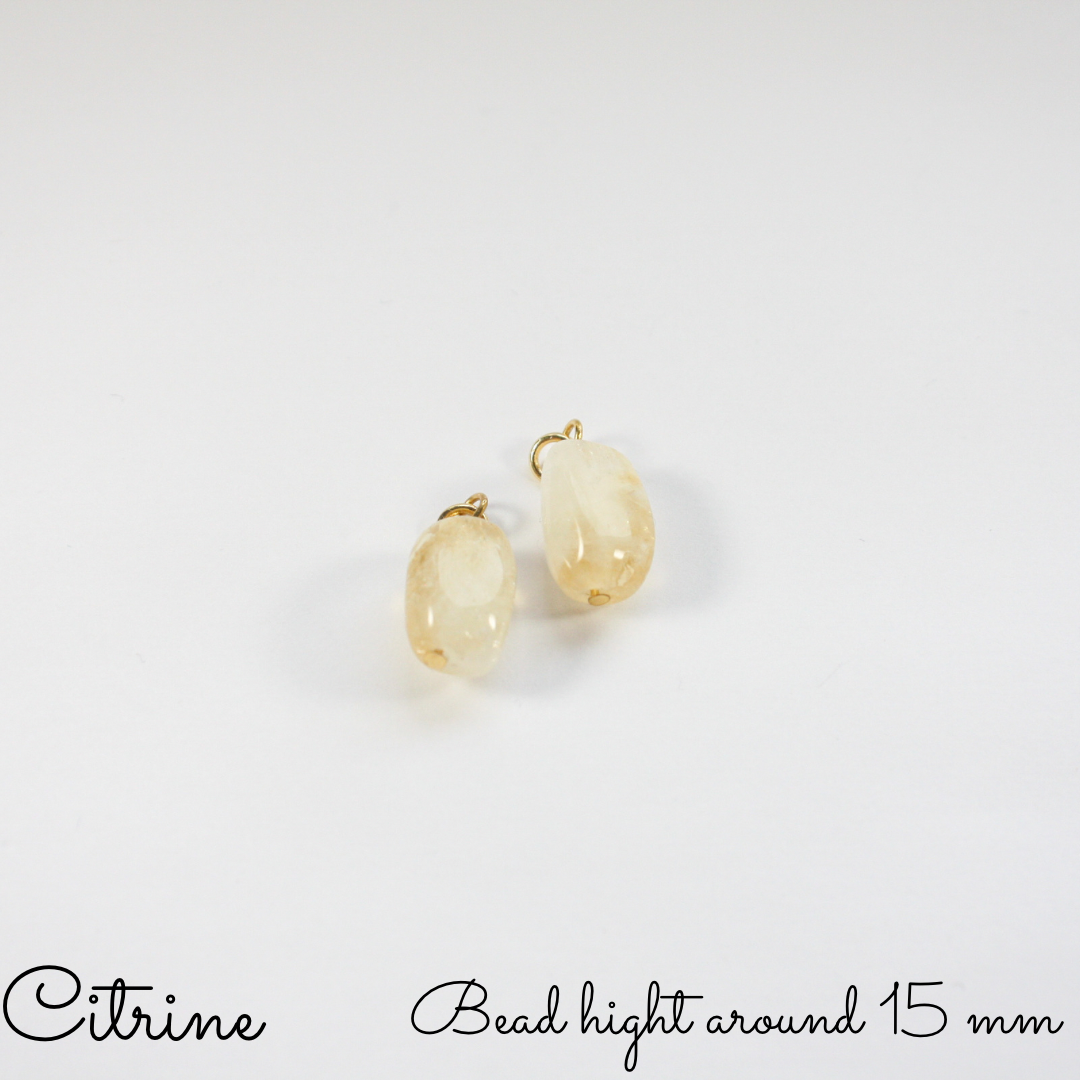 Dangle gemstone earrings with gold plated sterling silver hoops. There are 6 different gemstone bead options to choose from: Quartz,  Rose Quartz, Citrine, Green Stone, Jasper, Pink Stone. Roikkuvat kivihelmikorvakorut kullatulla ruostumaton teräs korvakorurenkaalla. Valittavana kuusi erilaista kivihelmeä: Kvartsi, Ruusukvartsi, Sitriini, Vihreä Kivi, Jaspis ja Vaaleanpunainen Kivi. 