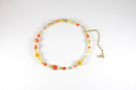 Sitrine beads size of 6 mm and different size of glass beads choker necklace orange and yellow colors. Clasp and extension chains are gold colors. 